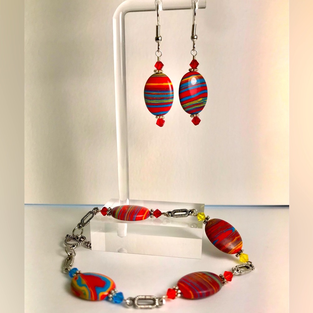 Handcrafted rainbow turkey turquoise and crystal bracelet and earring set.